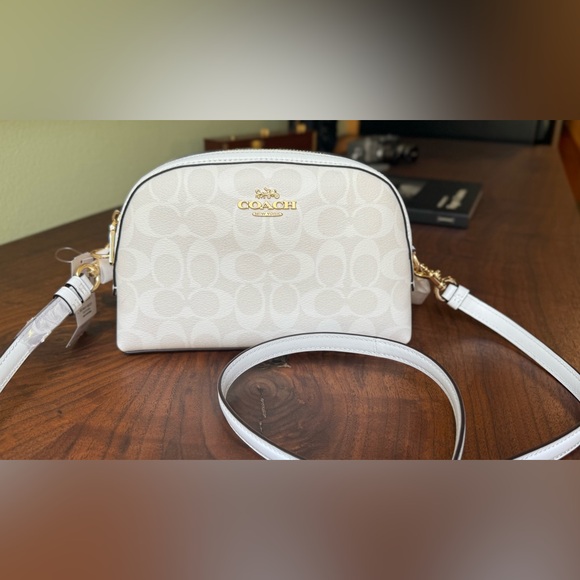 Coach Ivory Crossbody Bag with Gold Accents